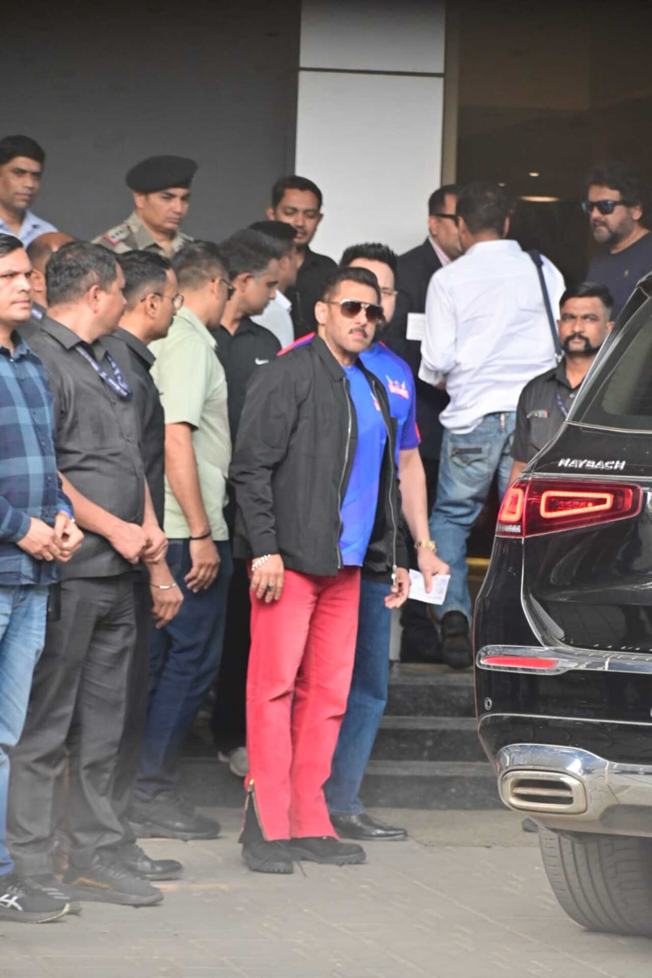 Salman Khan was spotted at the airport sporting a bold casual look. He paired a crisp blue T-shirt with a black jacket, adding a pop of color with striking red pants.